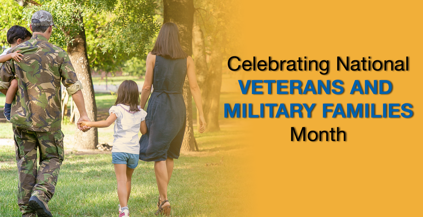  family holding hands with dad in military uniform all are walking in front of the camera